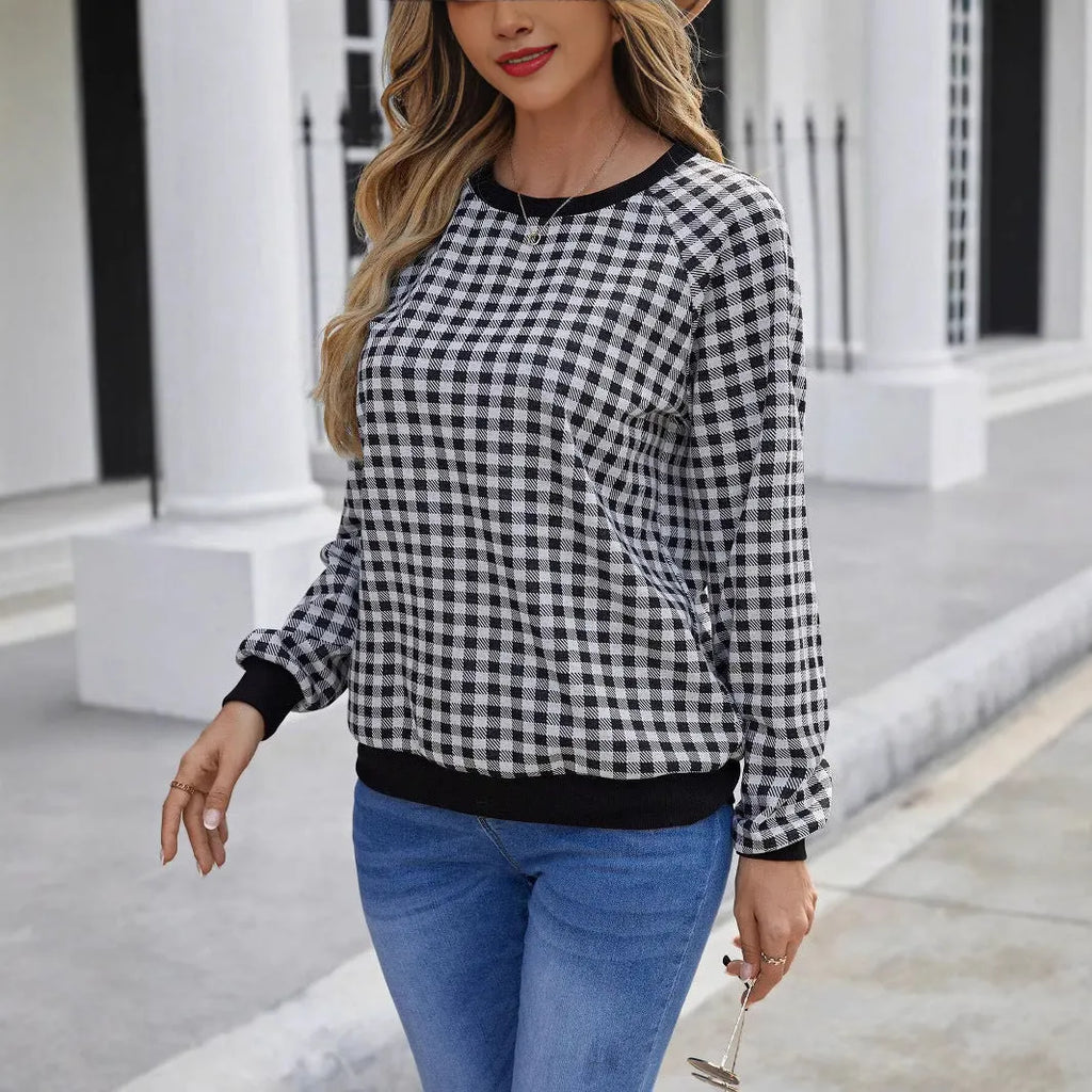 Black long sleeve pullover sweater with a printed Japanese plaid pattern
