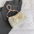 Women's canvas shoulder handbag in horizontal square shape with sandwich pockets and internal phone compartment