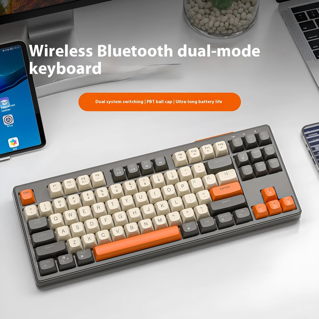 Wireless Bluetooth dual-mode keyboard in compact 38cm design with USB cable and receiver