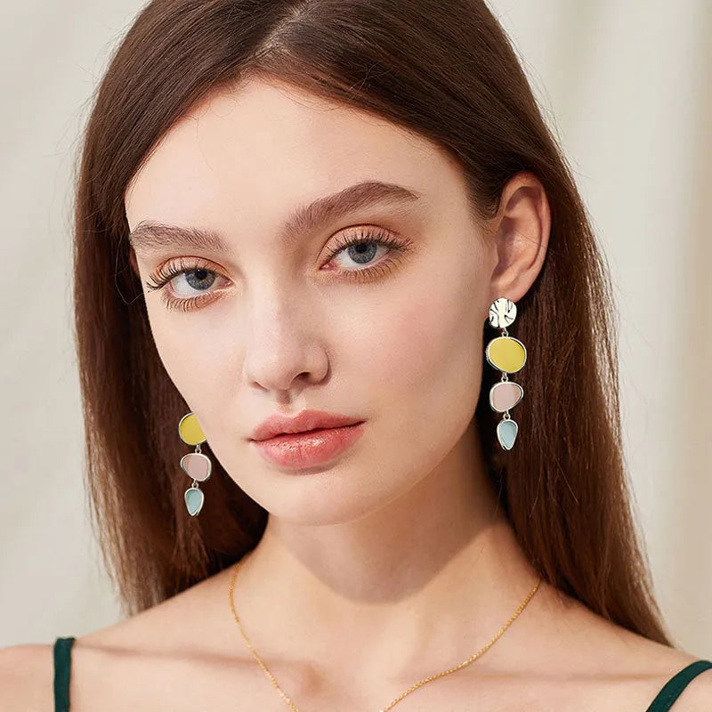 Morandi three-colour oil-drip finish on simple alloy disc vintage earrings with sterling silver post.