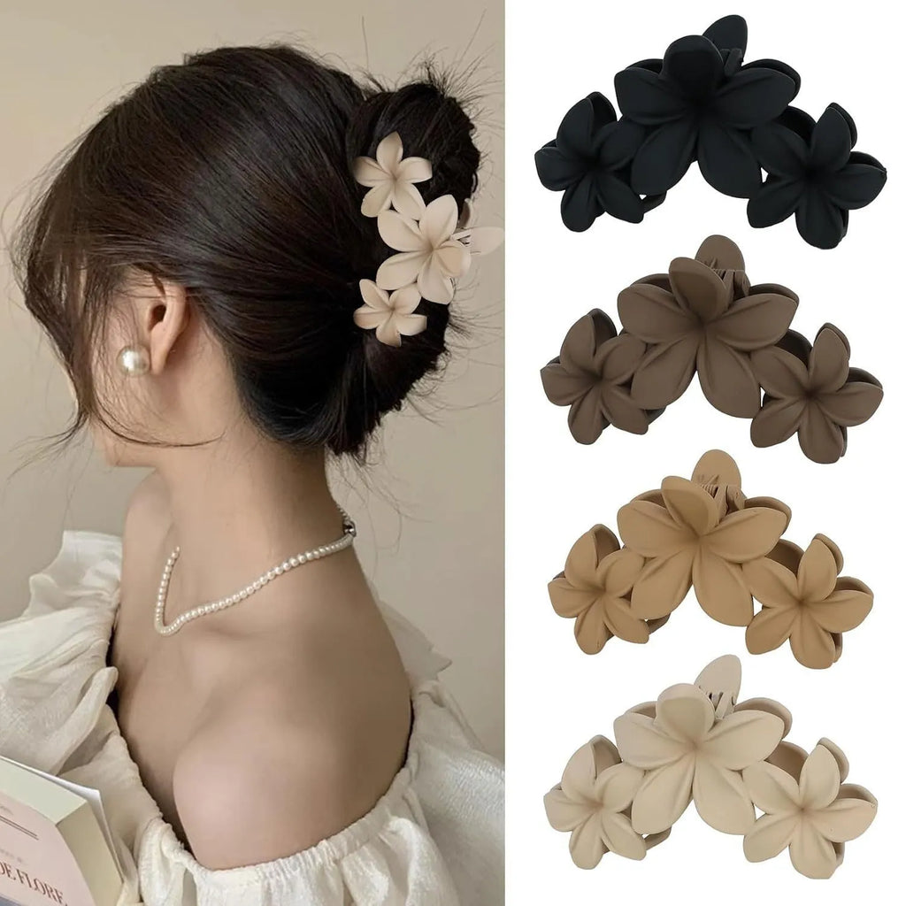 Six plastic hair clips with frosted grip and quadrilateral design in nude and rose red colours