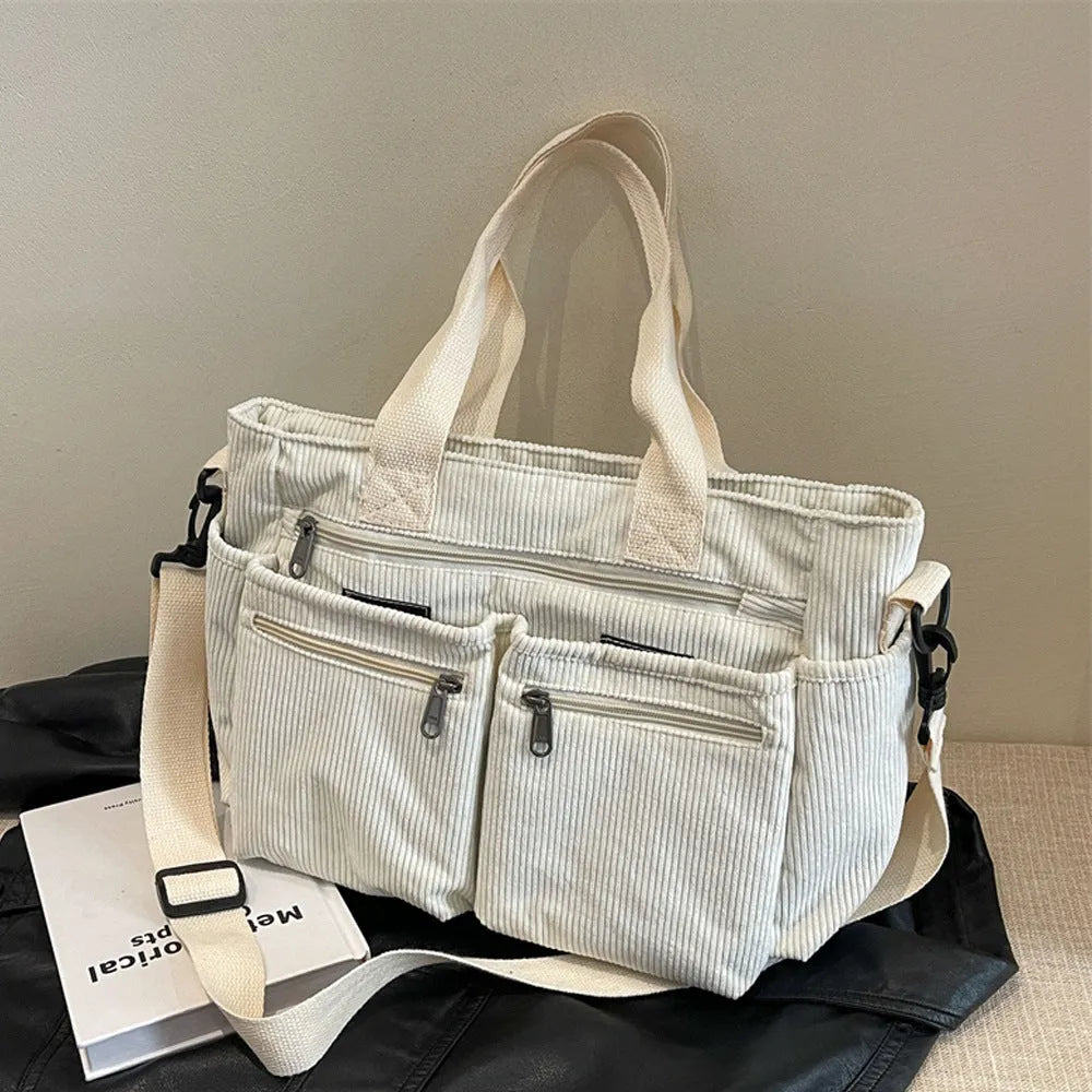 Women's corduroy messenger bag in beige, large capacity, horizontal square shape, on white background