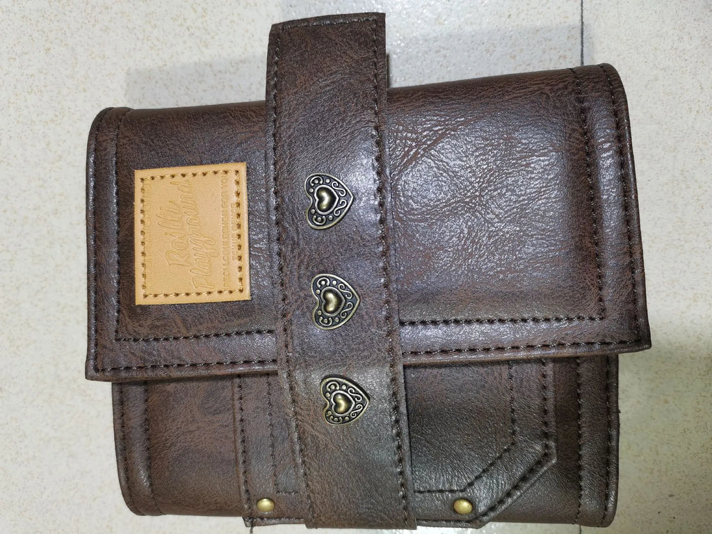 Brown retro-style A7 notebook with a leather buckle design and loose-leaf binding