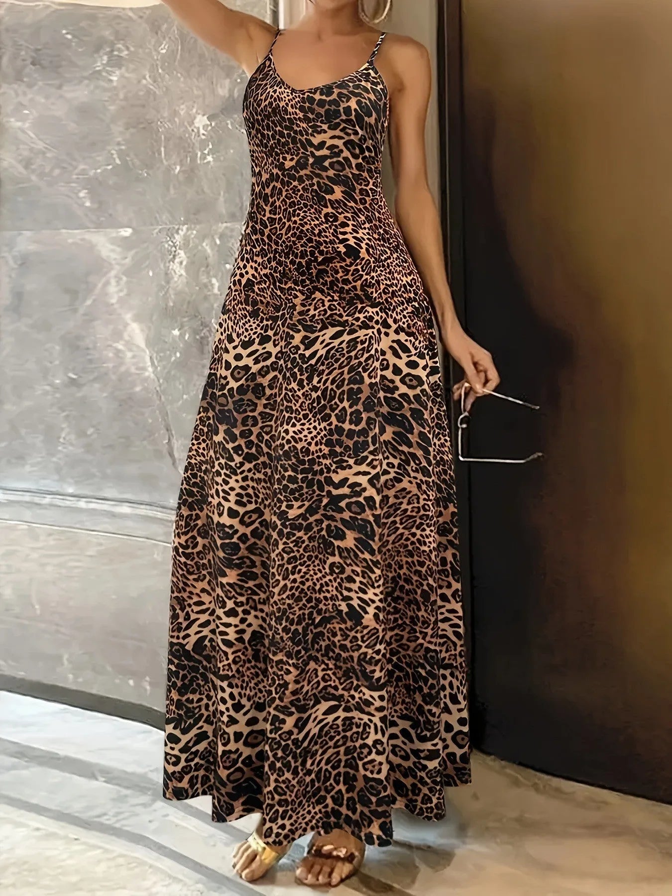 Dark brown leopard print sleeveless dress with round neck and shoulder strap detail