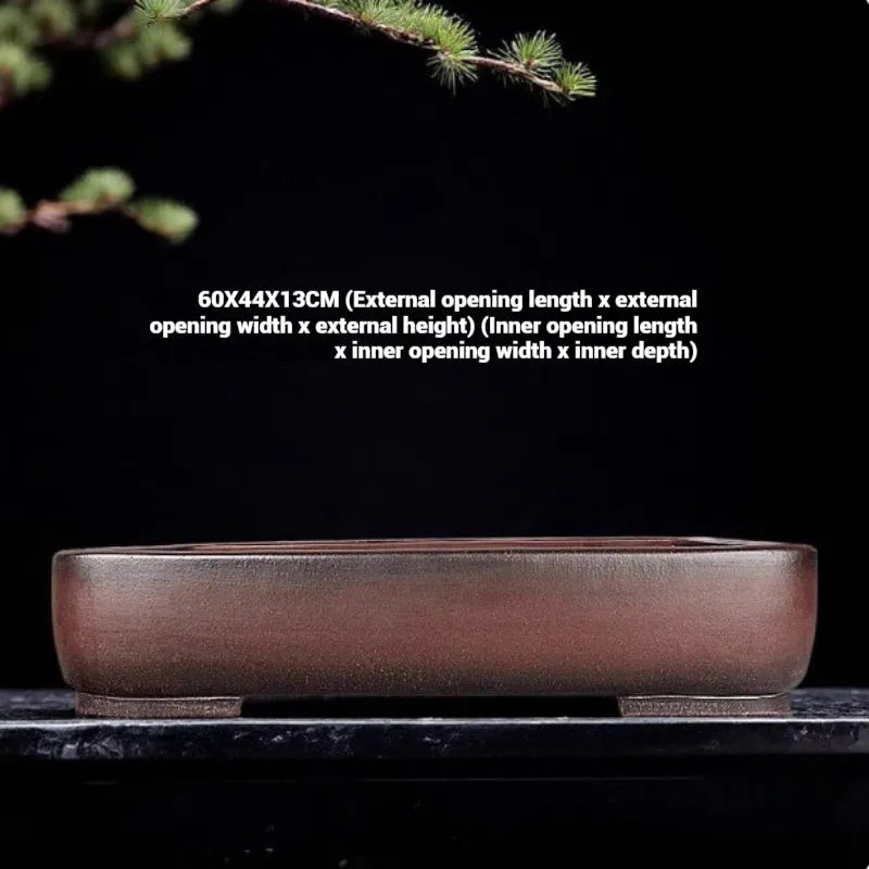 Handmade rectangular antique-style purple clay flower pot showing natural ceramic material