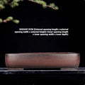 Handmade rectangular antique-style purple clay flower pot showing natural ceramic material