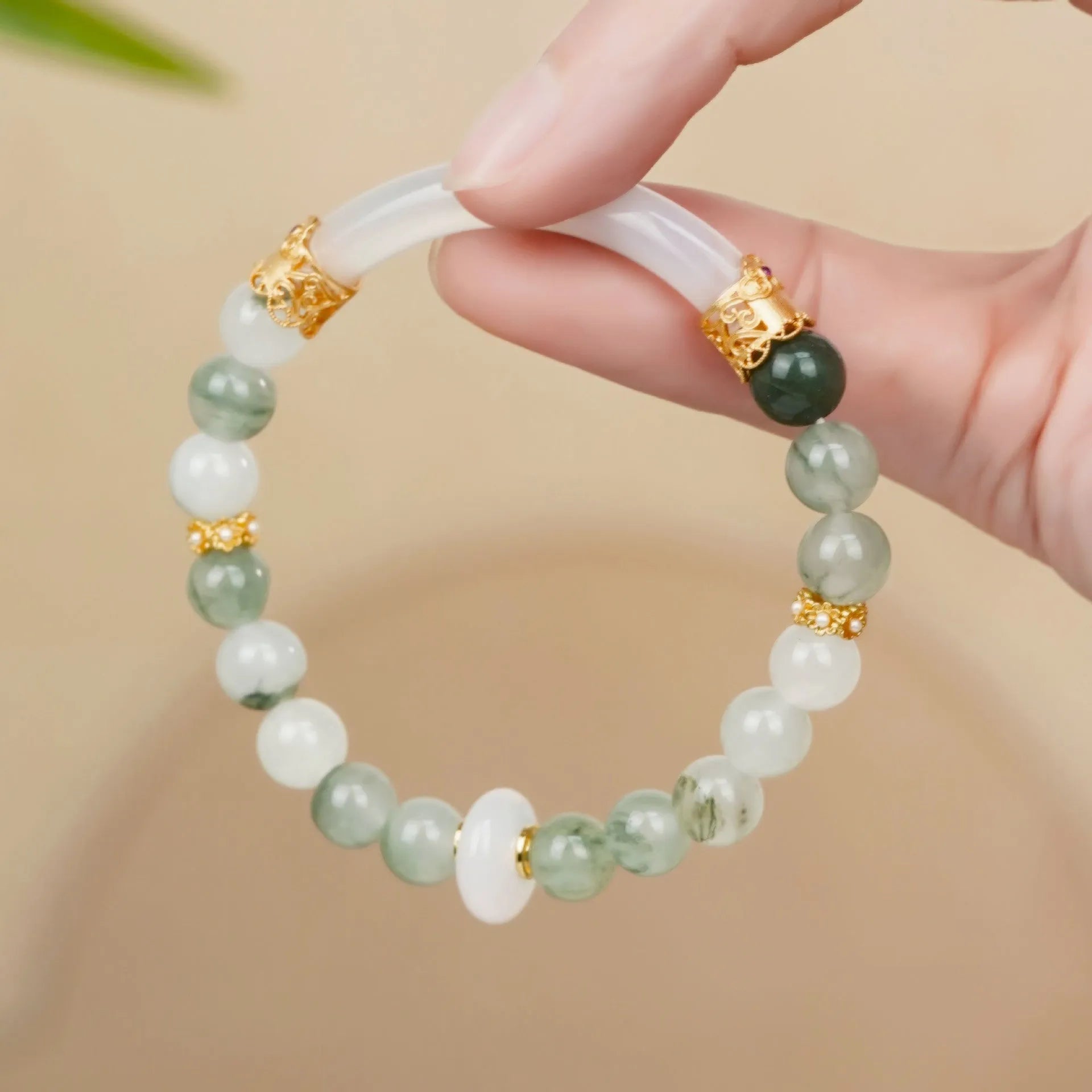 Emerald green Tian Shan Cui jade bracelet with floating flower girl half design and round elements