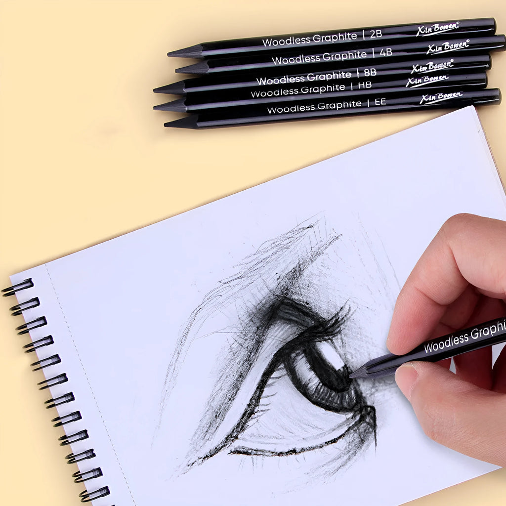 Set of six wood-free graphite sketching pencils with HB, 2B, 4B, 6B, 8B, and EE hardness grades