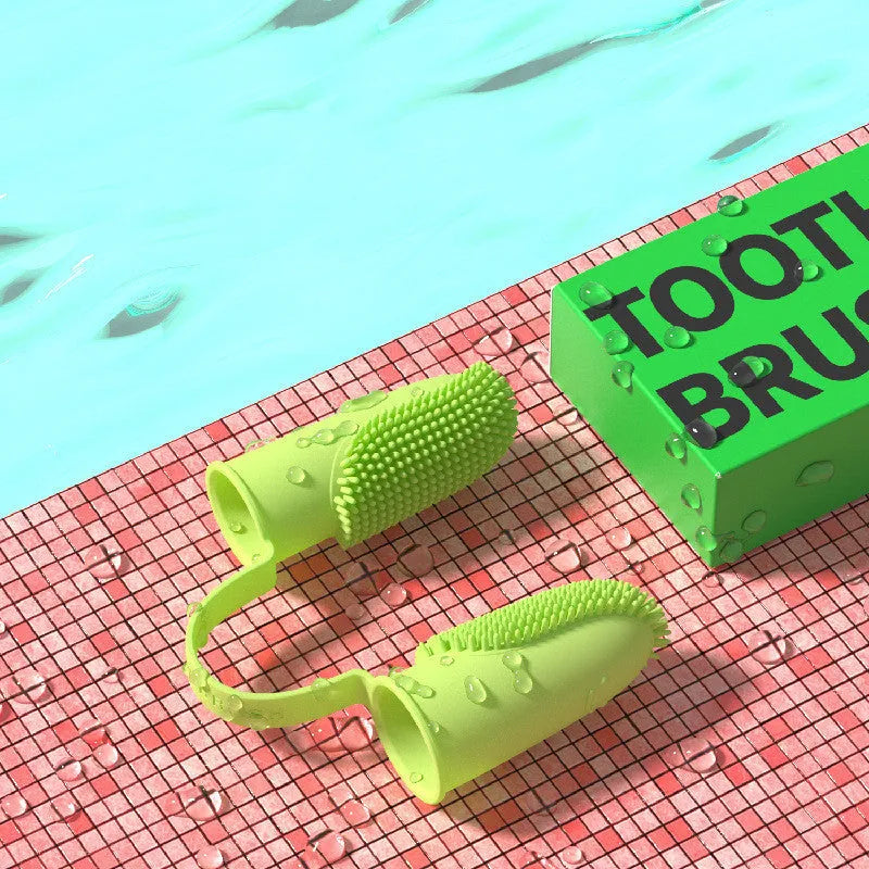 TPR finger cover for pet tooth cleaning in pink, blue green, and yellow.