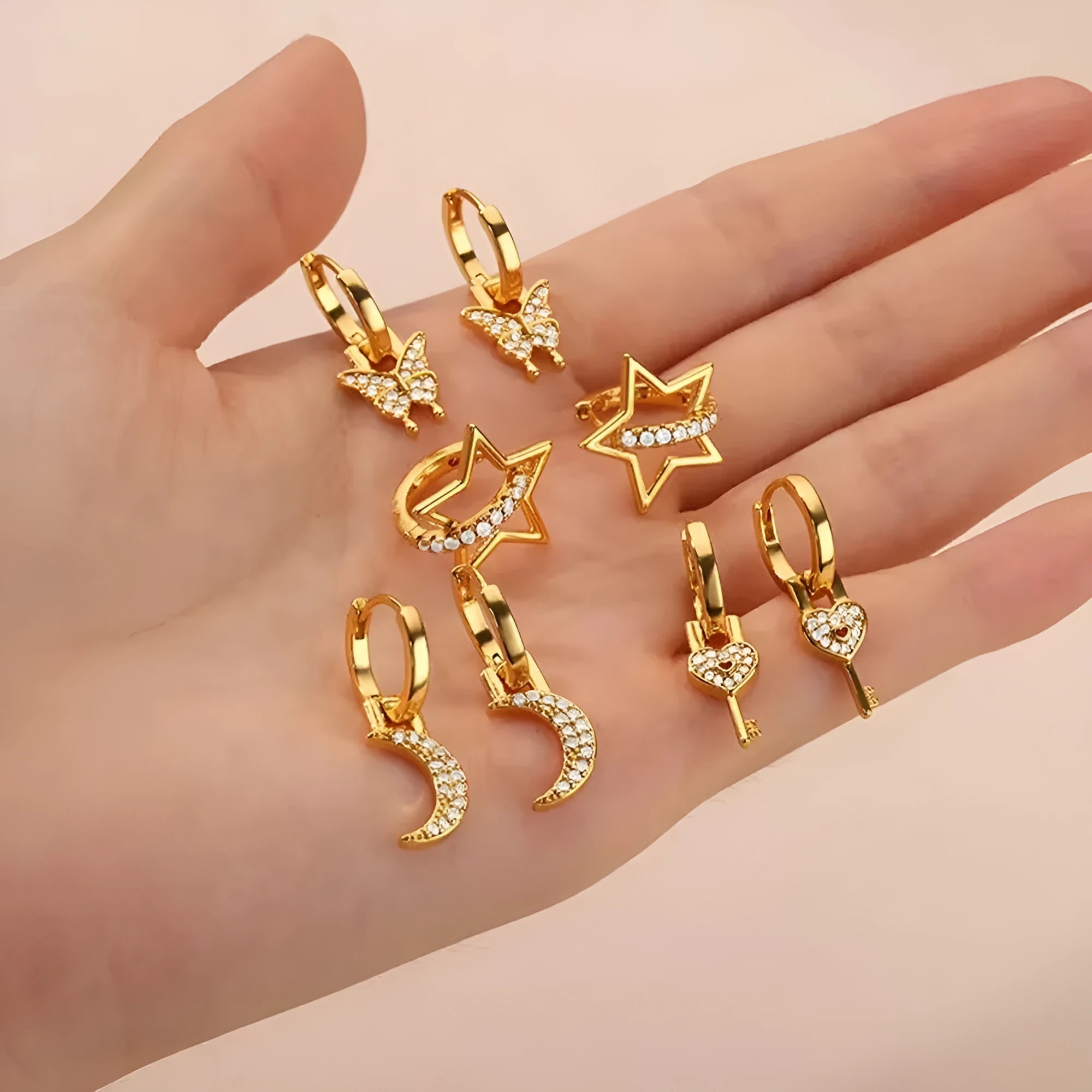 Women's geometric butterfly copper earrings with heart, bow, and star designs in multiple colour finishes