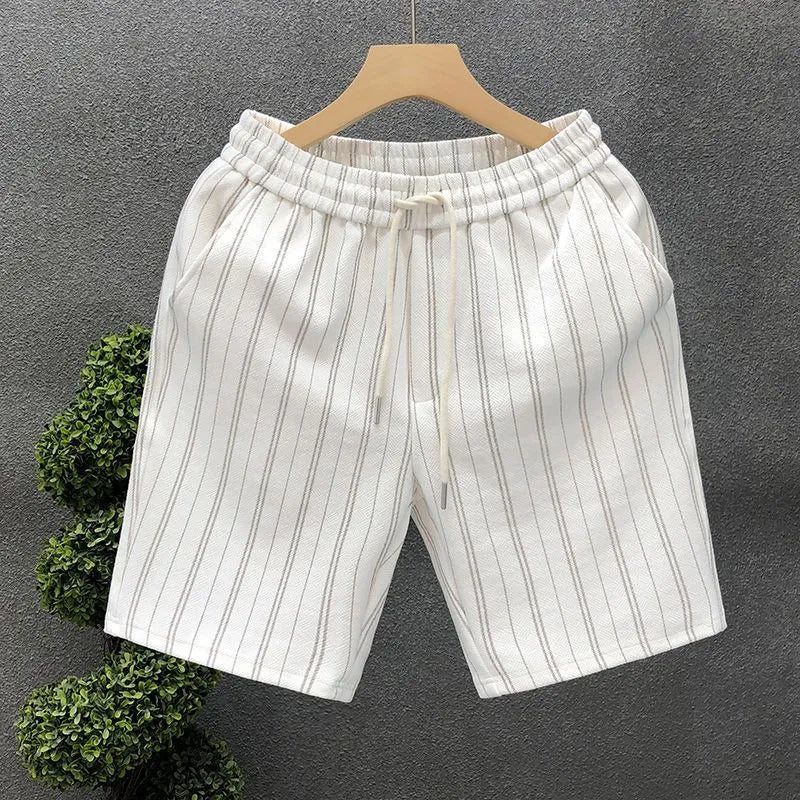 Men's black and white striped casual shorts with fleece lining and elastic waistband