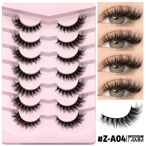 Natural false eyelashes set with adhesive glue in thick long style