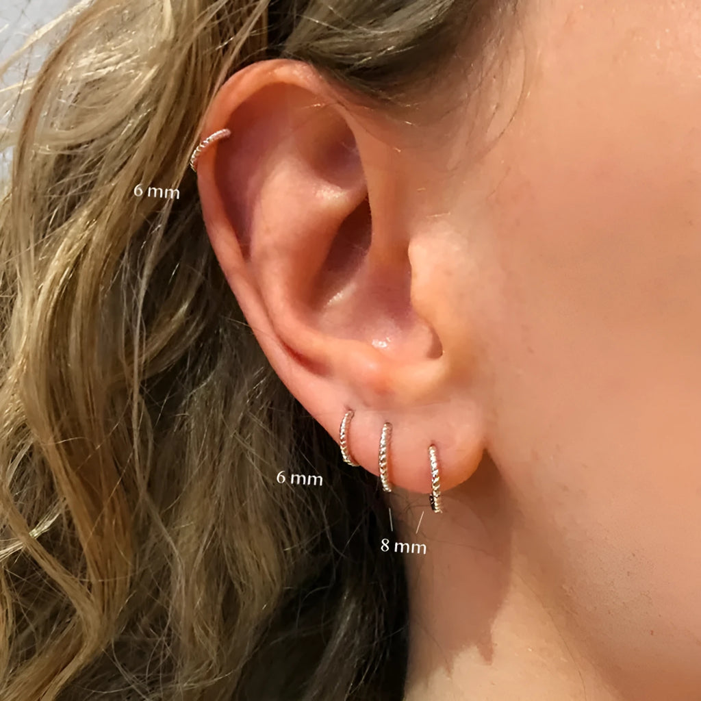 S925 sterling silver twisted string round hoop earrings in gold or platinum finish.