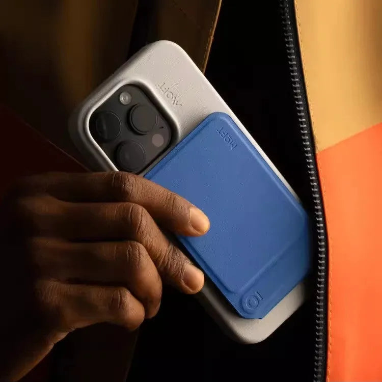 Black magnetic mobile phone holder case showing slim 6.9mm profile and built-in magnet for car mounts.