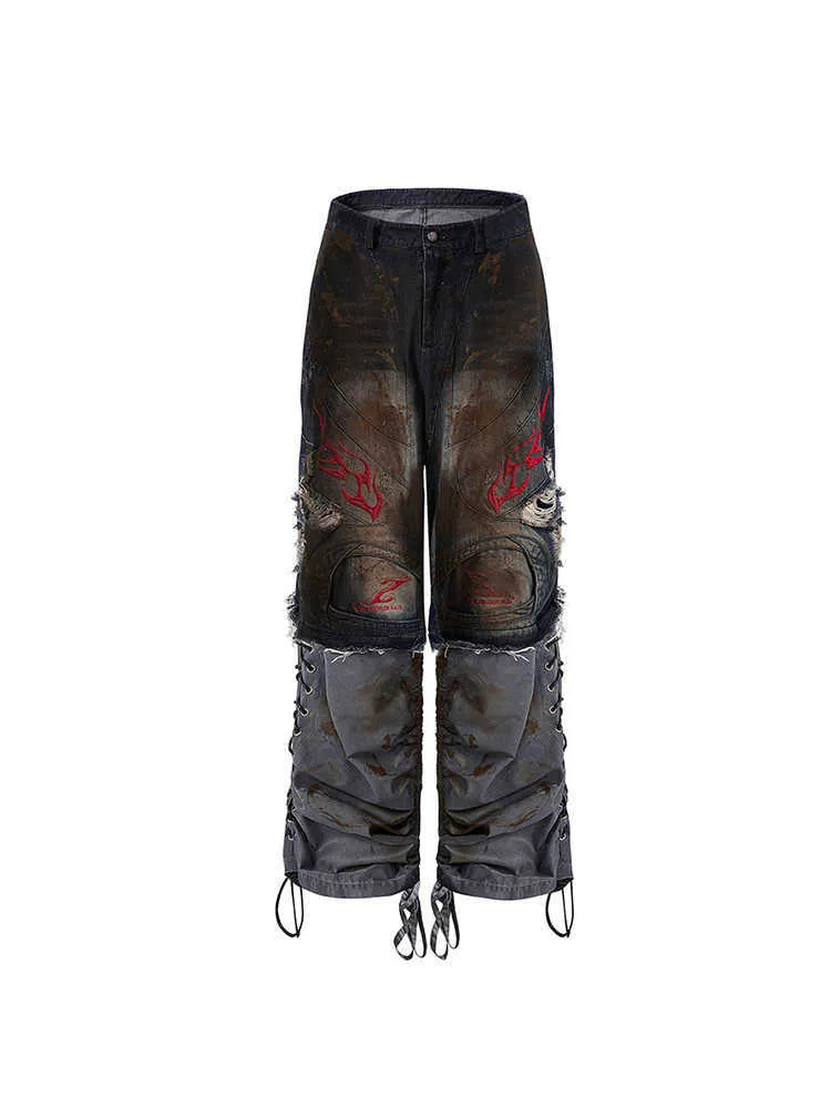 Men's retro style denim jeans with detachable trouser legs in a wide leg, loose fit.