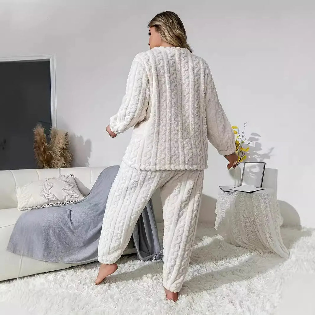 Women's milky white polyester trousersuit with crew neck top and matching trousers