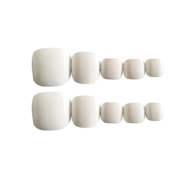 White artificial nails with starry sky pattern and pre-applied adhesive backing