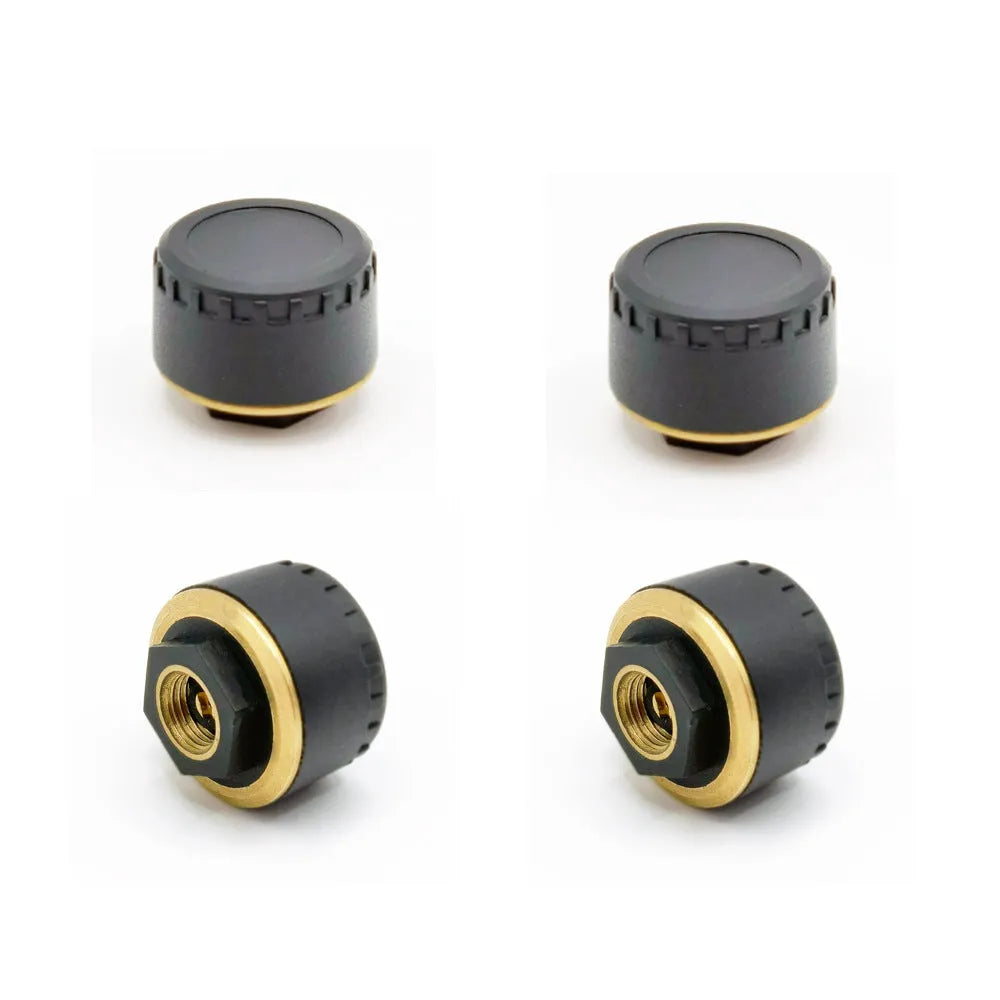 Four black Bluetooth tyre pressure sensor caps for car with mobile phone display