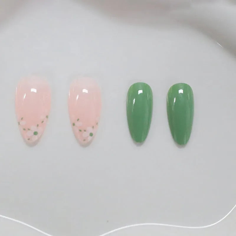 Long almond artificial nails with white little flower pattern and jelly glue rub in CW680 colour classification