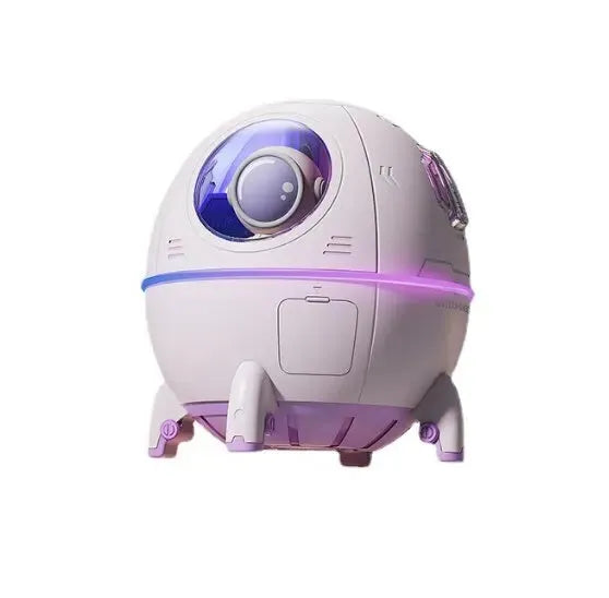 Astronaut-themed desktop humidifier with colourful LED lights showing 110mm cubic dimensions