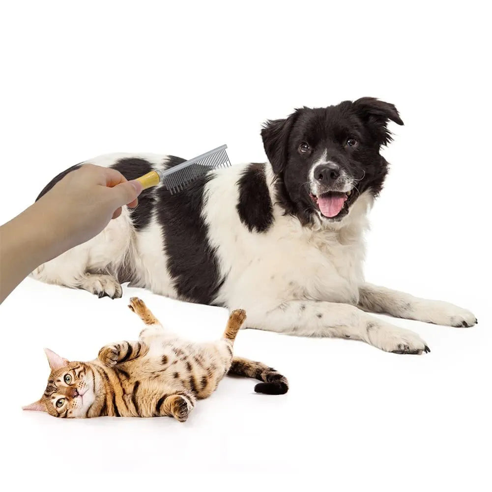 Wooden handle pet grooming comb for dogs and cats on a plain background