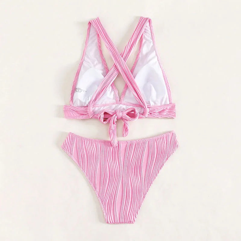 Women's black halter strap bikini top and matching shorts laid flat.