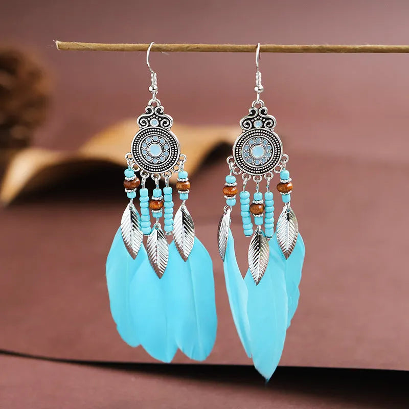 Round drop feather earrings with leaf pattern in alloy metal, available in multiple colours