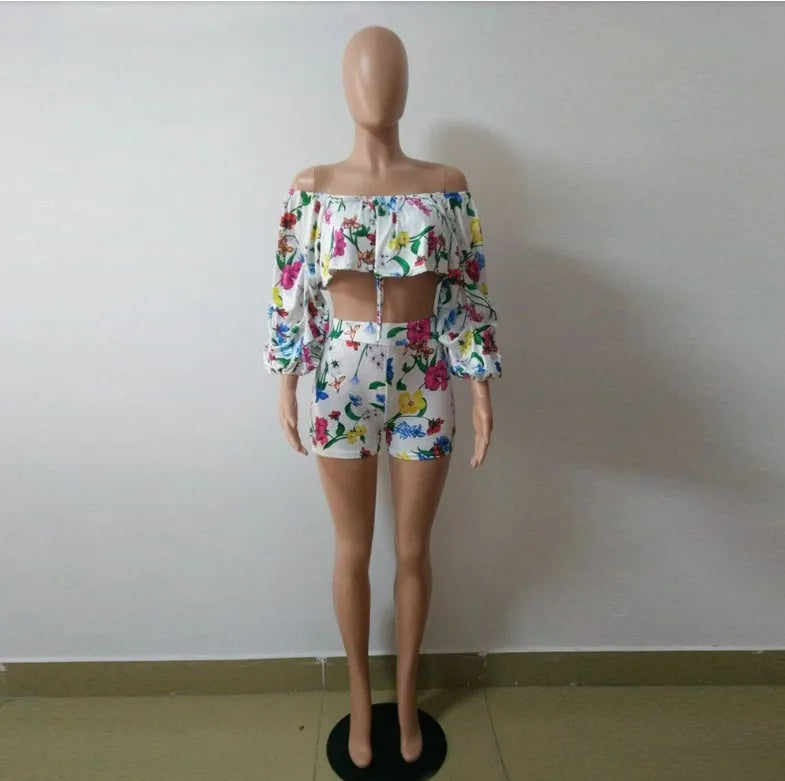 Women's multicolour digital print two-piece set with textured pile sleeves on the top and matching shorts.