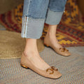 Women's black Wanwan Lei style Mary Jane pumps with square toe and super high heel on a rubber sole.