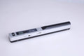 Handheld USB barcode scanner in choice of five colours: black, blue, green, red, silver.
