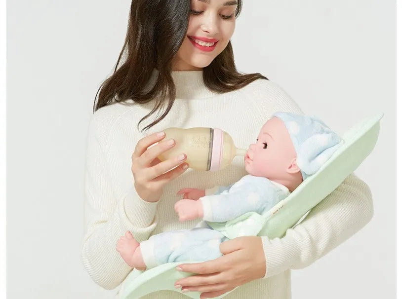 Beige cross-shaped breastfeeding pillow with high-elastic EVA filler on a white background