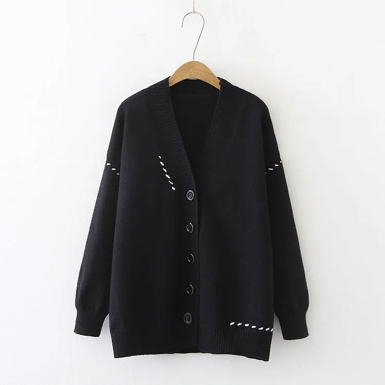 Women's loose knitted cardigan coat in black solid colour with long sleeves