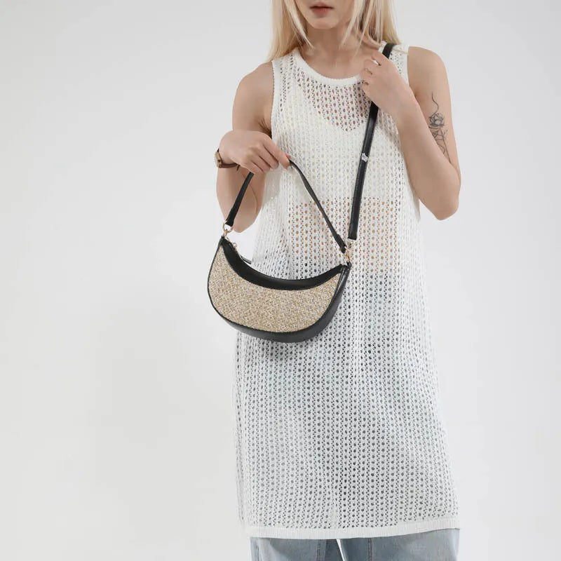 Hard straw dumpling-shaped crossbody bag with single strap and sandwich pocket in black, brown, green or white colour options