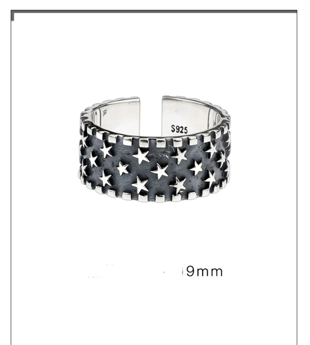 Adjustable sterling silver ring with geometric five-pointed star pattern