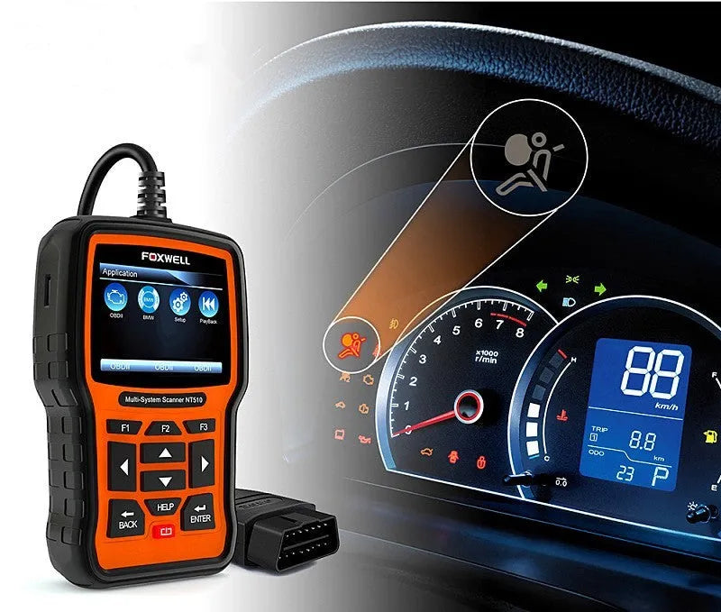 Foxwell NT510 orange and black automotive diagnostic scanner with OBD2 data cable.