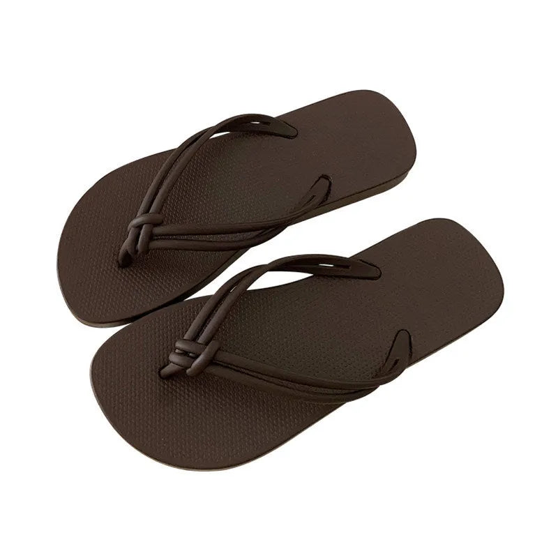 Men's casual PVC flip flops in beige with toe-covering style and injection moulded sole.