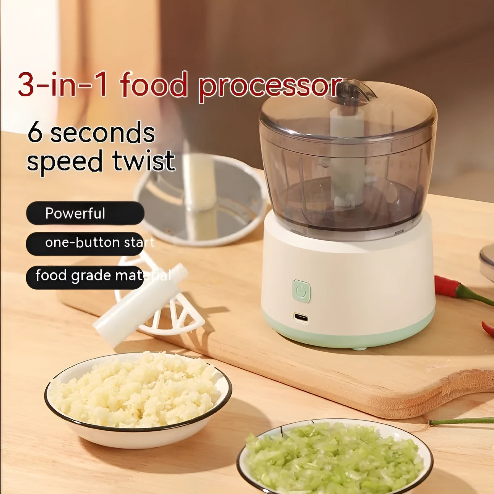 Mini electric meat grinder with transparent processing cup and stainless steel blades in white or light green