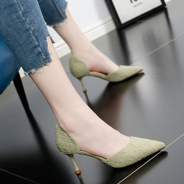 Women's black pointed toe stiletto high heels with a 6-8cm heel on a rubber sole