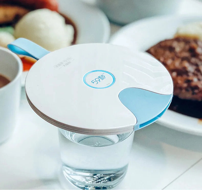 Blue USB-powered baby bottle steriliser showing slim 11.8mm profile with gravity-sensing technology