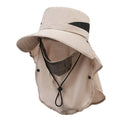 Man wearing a grey adjustable wide-brim fisherman hat made of polyester for sun protection.