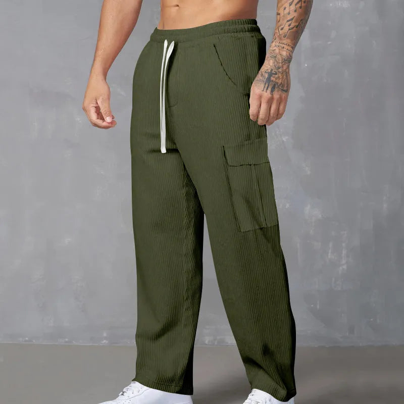 Men's corduroy cargo trousers with wide-leg cut and drawstring waist in navy blue colour