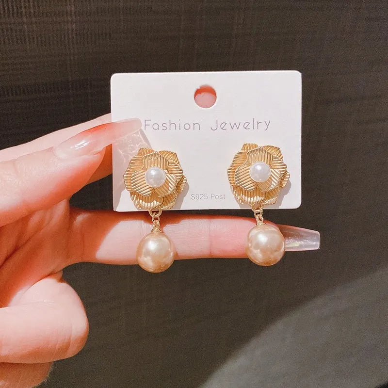 Gold colour flower stud earrings with needle rose pearl design and opal stone