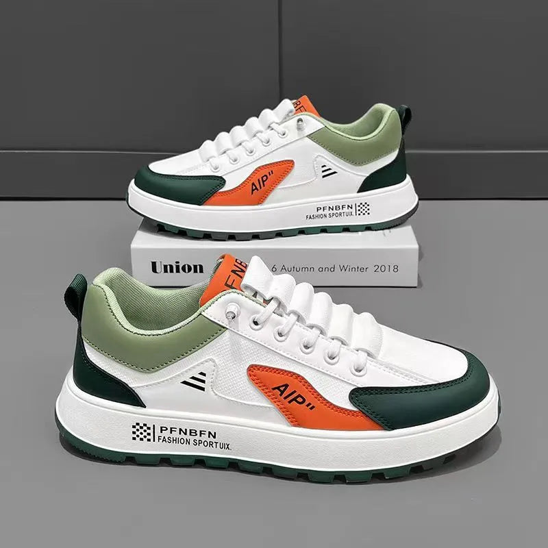 Men's white and orange artificial PU casual shoes with round toe on a solid background.