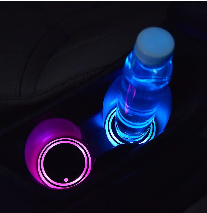 LED light-up car cup holder coaster showing seven colour options with solar panel and USB charging