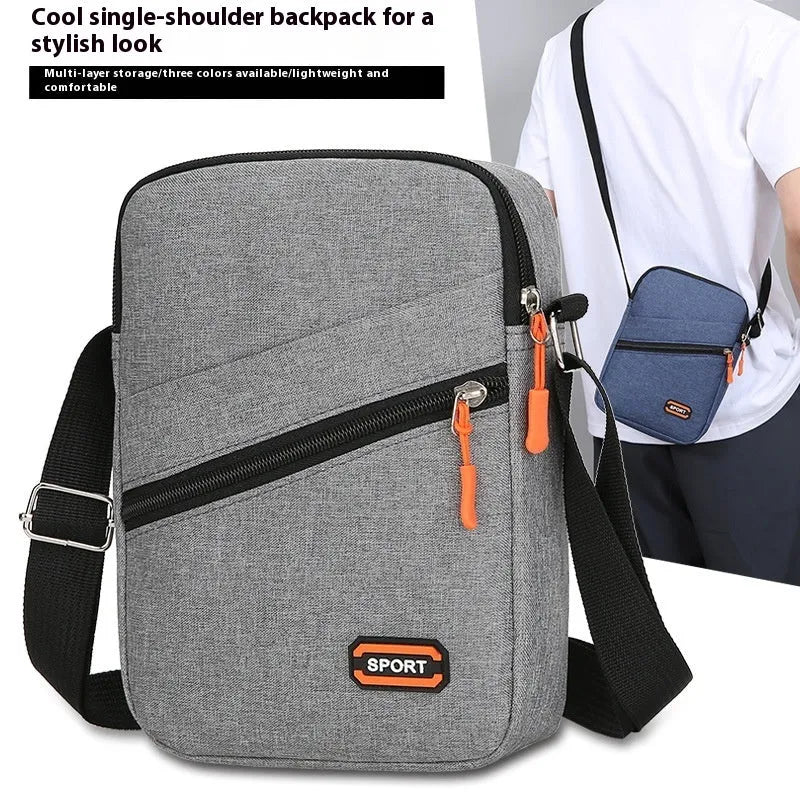 Oxford cloth commuter crossbody bag in silver grey, black or navy blue with contrast colour details