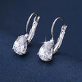 Women's drop-shaped simple metal fashion earrings in gold and platinum colour options.