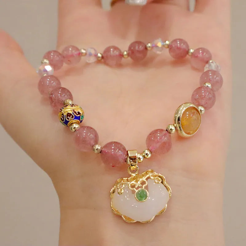 Geometric ethnic bracelet with strawberry quartz stones and metal decoration
