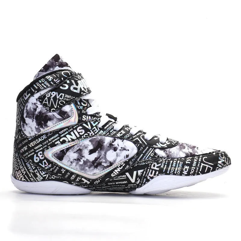 Men's high-top boxing shoes with graffiti style, black colour, front lace-up closure, mesh upper, and rubber outsole on a flat surface.
