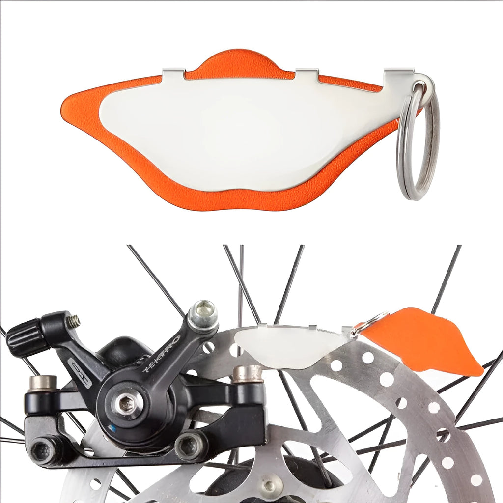 Mountain bike disc brake pads with scratch-proof grinding disc in black or orange colours