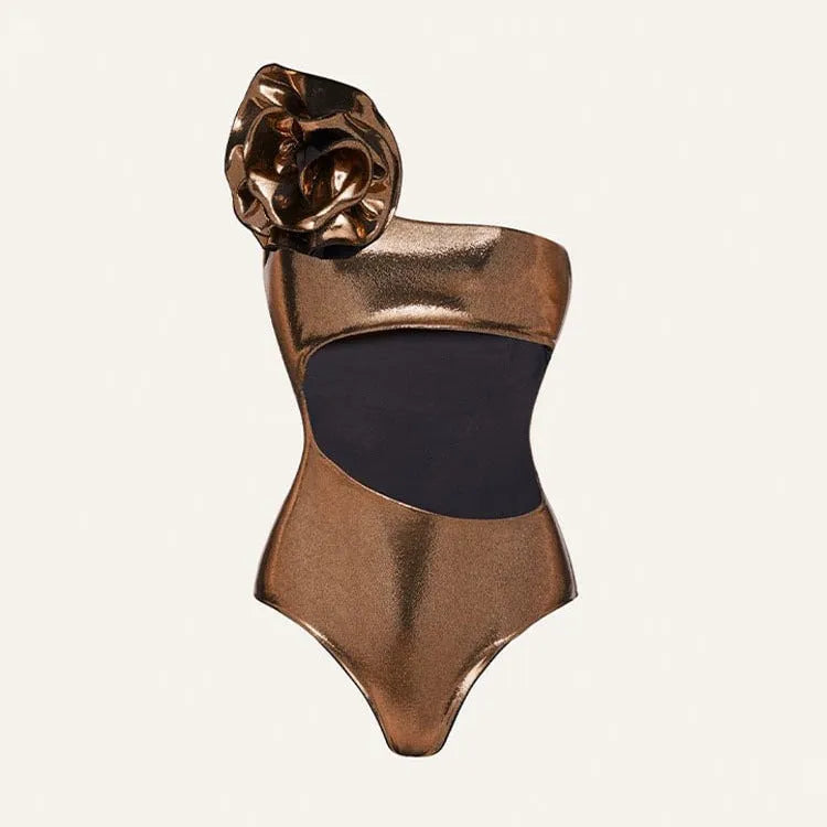 Gold coloured halter neck one piece swimsuit with a handmade hollow out flower design on the front.